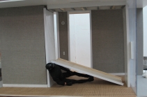 man hit by door